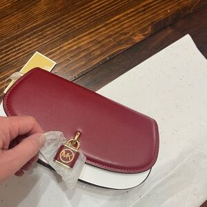 Michael Kors Burgundy Leather Clutch with Gold Accent